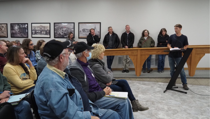  St. Marys residents line the walls to listen to the discussion of the library’s lease renewal during a Nov. 15, 2022, city commission meeting. (Rachel Mipro/Kansas Reflector)