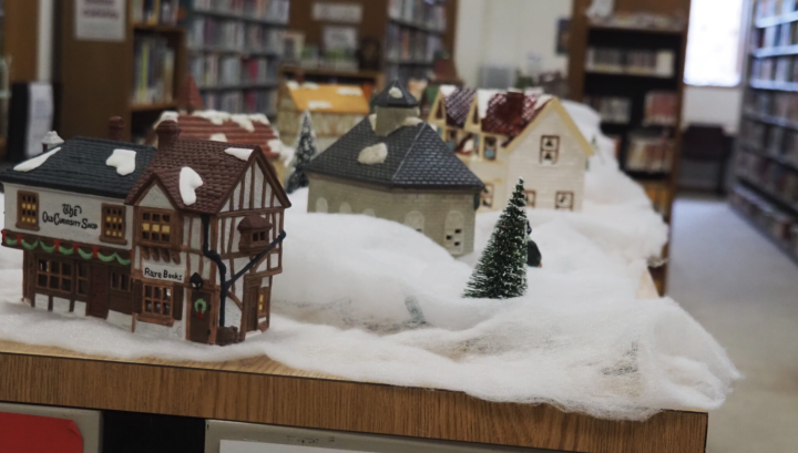A Christmas village display is set up inside the Pottawatomie Wabaunsee Regional Library. (Rachel Mipro/Kansas Reflector)