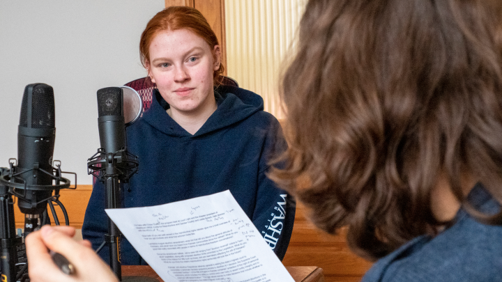 Chloe Chaffin, facing the camera, appears with Kansas Reflector reporter Rachel Mipro for a podcast recording on March 23, 2023, at the Kansas Reflector office in downtown Topeka. (Sherman Smith/Kansas Reflector)