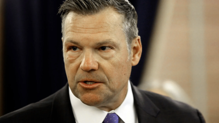 Kansas Attorney General Kris Kobach answers questions during a news conference about a new state law that defines male and female in state law so that transgender people can't change their driver's licenses and birth certificates to reflect their gender i