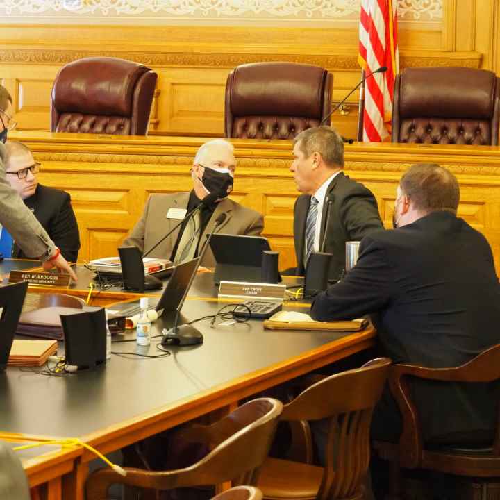 The Kansas House joined with the Kansas Senate to override Gov. Laura Kelly’s veto of a congressional redistricting map for use in the 2022 election cycle. In the House, the partisan work on redistricting is led by Republican Rep. Chris Croft, right, and 