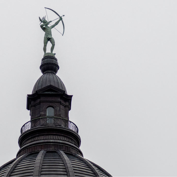  The Ad Astra statue atop the Statehouse aims for a brighter tomorrow on a gloomy Jan. 24, 2023. (Sherman Smith/Kansas Reflector)