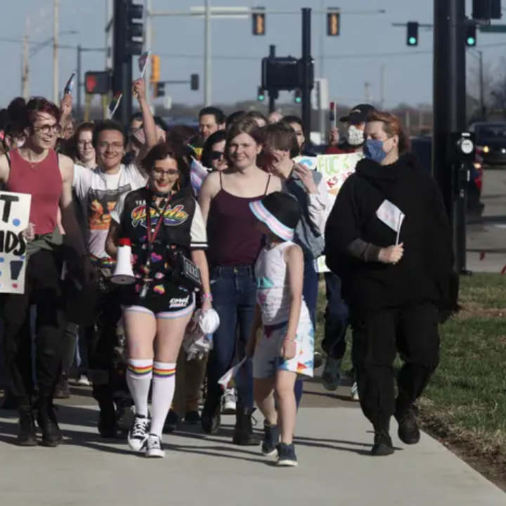 Protesters march outside the Kansas Statehouse on Transgender Day of Visibility, March 31, in Topeka, Kansas. John Hanna /AP