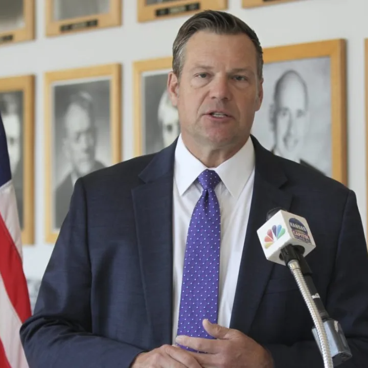 Kansas Attorney General Kris Kobach answers questions from reporters during a news conference outside his office, Monday, May 1, 2023, in Topeka, Kan. (AP Photo/John Hanna, File)