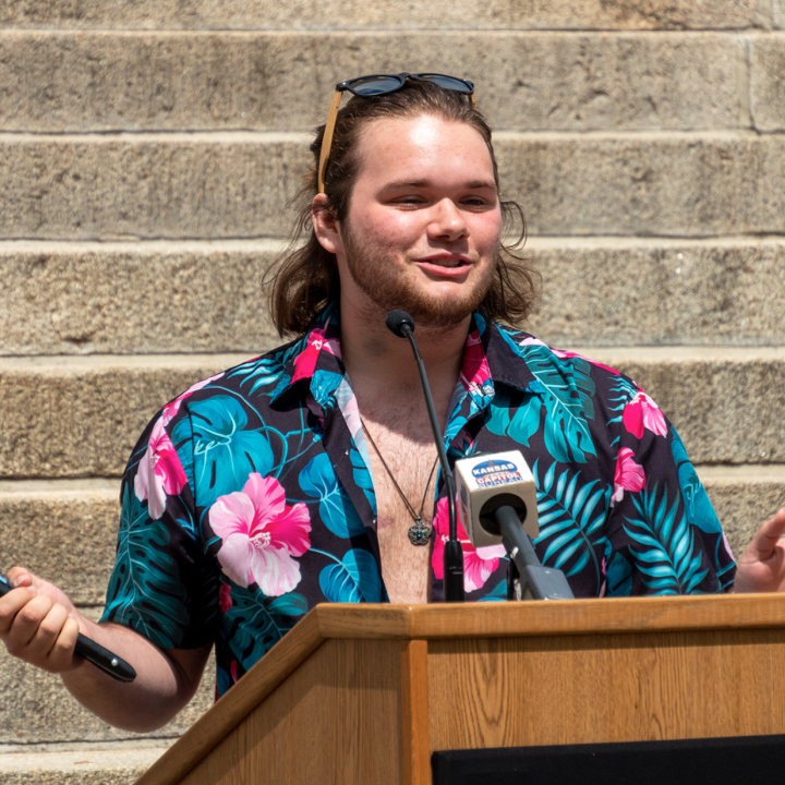 Adam Kellogg speaks during rally in support of transgender rights May 5, 2023, at the Statehouse in Topeka. Kellogg is one of the five transgender Kansan's represented by the ACLU in a case involving gender markers on driver's licenses. (Sherman Smith/Kan