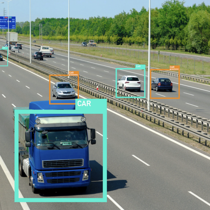 Cars driving on highway with AI boxes identifying them