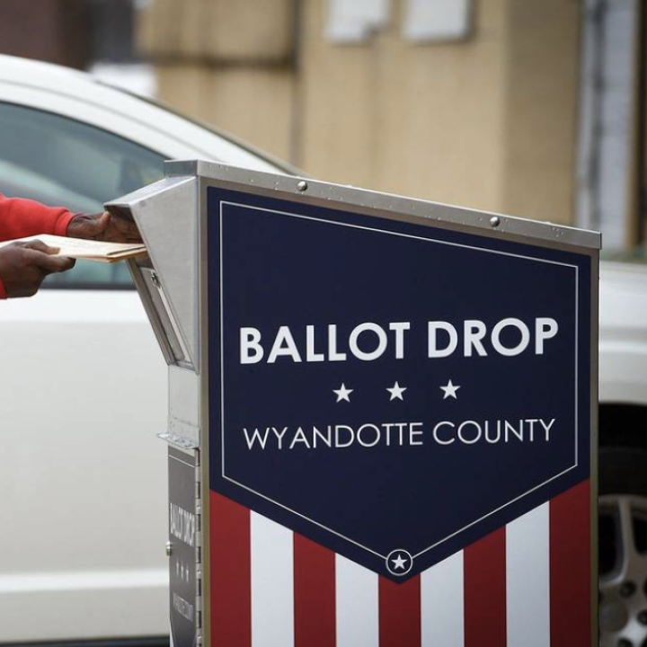 A voter drops off their ballot at a drop box in Wyandotte County during the 2020 election. TAMMY LJUNGBLAD tljungblad@kcstar.com  Read more at: https://www.kansascity.com/news/local/article279738504.html#storylink=cpy