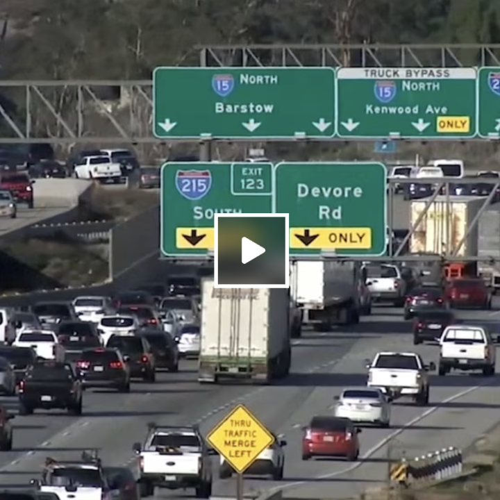 Screenshot of a video newstory; cars in traffic on Kansas highway