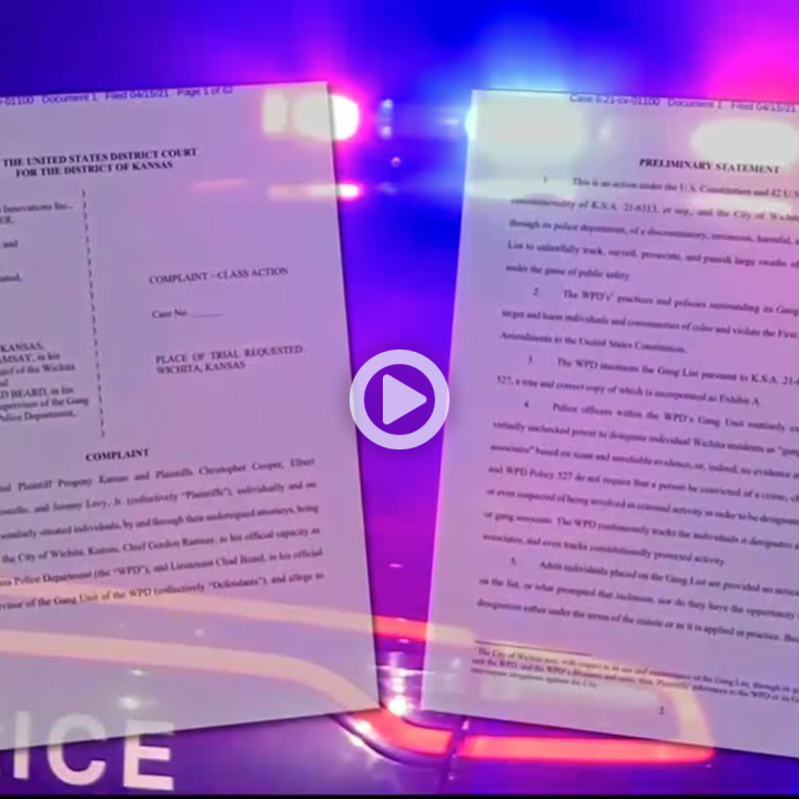 Thumbnail of news video showing papers of settlement