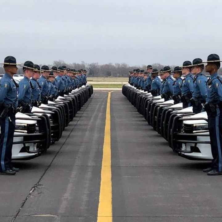 kansas highway patrol officers lined up with cars