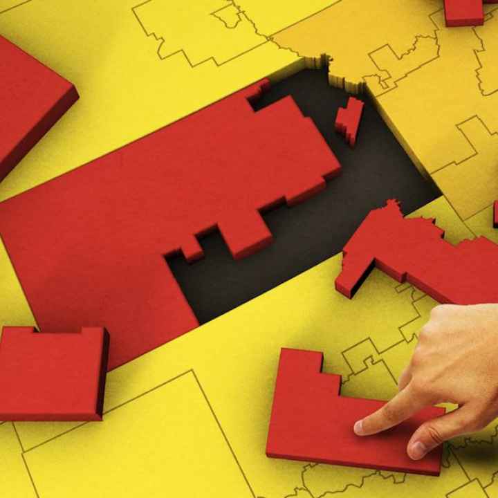 Picture of the state of Kansas as a puzzle being put together